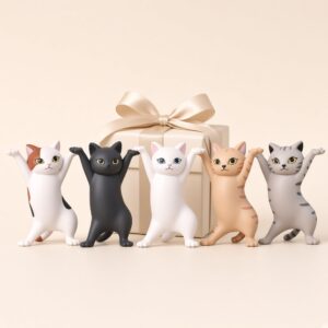 Cat figurine desk holder set of 5 in front of a gift box, small gift idea